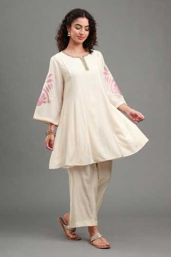 Shop Kyra By Bhavna Ivory Chanderi Round Neck, Yes Tahira Peplum Kurta And Pant Set Online at Aza Fashions Shop_Kyra By Bhavna_Ivory Chanderi Round Neck, Yes Tahira Peplum Kurta And Pant Set _Online_at_Aza_Fashions