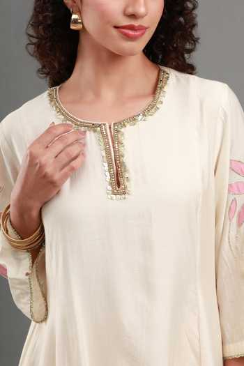 Kyra By Bhavna Ivory Chanderi Round Neck, Yes Tahira Peplum Kurta And Pant Set at Aza Fashions Kyra By Bhavna_Ivory Chanderi Round Neck, Yes Tahira Peplum Kurta And Pant Set _at_Aza_Fashions