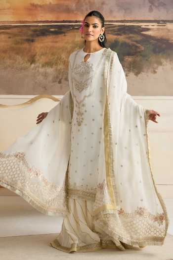 Shop RINESSA Ivory Organza, Cotton Satin Round Neck Amara Embellished Kurta Gharara Set Online at Aza Fashions Shop_RINESSA_Ivory Organza, Cotton Satin Round Neck Amara Embellished Kurta Gharara Set _Online_at_Aza_Fashions