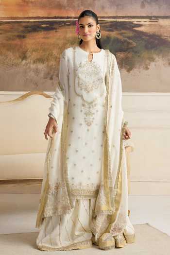 RINESSA Ivory Organza, Cotton Satin Round Neck Amara Embellished Kurta Gharara Set at Aza Fashions RINESSA_Ivory Organza, Cotton Satin Round Neck Amara Embellished Kurta Gharara Set _at_Aza_Fashions
