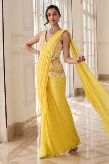 RINESSA Yellow Georgette, Net, Shantoon V-neck Embroidered Peplum Top And Saree Set Online at Aza Fashions RINESSA_Yellow Georgette, Net, Shantoon V-neck Embroidered Peplum Top And Saree Set _Online_at_Aza_Fashions
