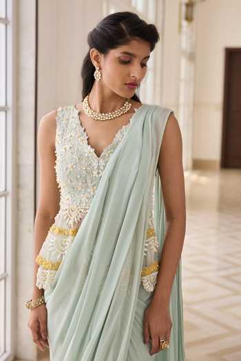 Buy RINESSA Mint Georgette, Net, Shantoon V-neck Embroidered Peplum Top And Draped Saree Set Online at Aza Fashions Buy_RINESSA_Mint Georgette, Net, Shantoon V-neck Embroidered Peplum Top And Draped Saree Set _Online_at_Aza_Fashions