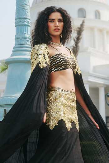 Shop RINESSA Black Silk, Net, Chiffon, Dupion, Embellished Cape And Fishcut Lehenga Set Online at Aza Fashions Shop_RINESSA_Black Silk, Net, Chiffon, Dupion, Embellished Cape And Fishcut Lehenga Set _Online_at_Aza_Fashions