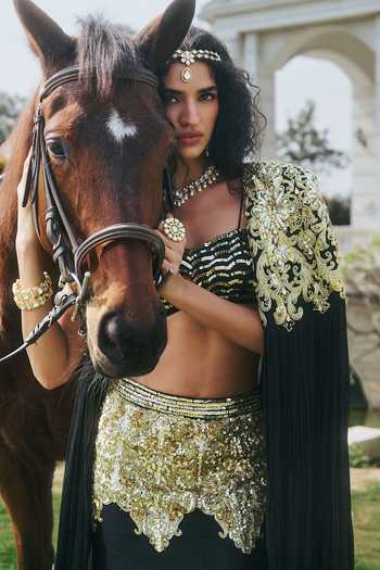 RINESSA Black Silk, Net, Chiffon, Dupion, Embellished Cape And Fishcut Lehenga Set at Aza Fashions RINESSA_Black Silk, Net, Chiffon, Dupion, Embellished Cape And Fishcut Lehenga Set _at_Aza_Fashions