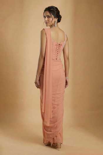 Buy Ellemora Fashions Peach Crepe Crystals Sweetheart Neck Grace Saree And Corset Set Online at Aza Fashions Buy_Ellemora Fashions_Peach Crepe Crystals Sweetheart Neck Grace Saree And Corset Set _Online_at_Aza_Fashions