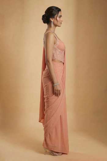 Shop Ellemora Fashions Peach Crepe Crystals Sweetheart Neck Grace Saree And Corset Set Online at Aza Fashions Shop_Ellemora Fashions_Peach Crepe Crystals Sweetheart Neck Grace Saree And Corset Set _Online_at_Aza_Fashions