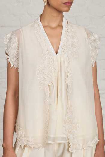 Shop Sue Mue Off White Chanderi V-neck, Isabell Applique Overlay Jacket And Harem Salwar Set Online at Aza Fashions Shop_Sue Mue_Off White Chanderi V-neck, Isabell Applique Overlay Jacket And Harem Salwar Set _Online_at_Aza_Fashions