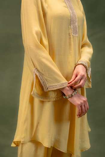Grass & Sunshine Yellow Modal Round Neck, Yes Golden Dune Lace Detailed Kurta And Salwar Set at Aza Fashions Grass & Sunshine_Yellow Modal Round Neck, Yes Golden Dune Lace Detailed Kurta And Salwar Set _at_Aza_Fashions