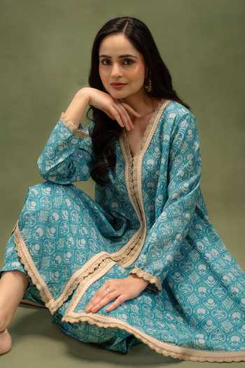 Grass & Sunshine Blue Chanderi Cotton V-neck Indigo Nomad Charm Kurta And Dhoti Pant Set at Aza Fashions Grass & Sunshine_Blue Chanderi Cotton V-neck Indigo Nomad Charm Kurta And Dhoti Pant Set _at_Aza_Fashions