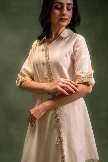 Grass & Sunshine Beige Cotton Collared Neck, Yes Moonstone Draped Kurta And Palazzo Set at Aza Fashions Grass & Sunshine_Beige Cotton Collared Neck, Yes Moonstone Draped Kurta And Palazzo Set _at_Aza_Fashions