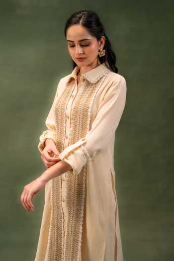 Buy Grass & Sunshine Beige Cotton Collared Neck, Yes Sand Dune Jute Lace Kurta And Palazzo Set Online at Aza Fashions Buy_Grass & Sunshine_Beige Cotton Collared Neck, Yes Sand Dune Jute Lace Kurta And Palazzo Set _Online_at_Aza_Fashions