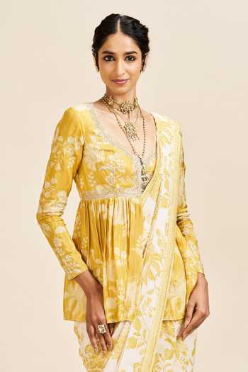 Shop Issa Studio By Chetana & Swathi Ivory Georgette V-neck Nihari Pre-draped Saree With Peplum Top Online at Aza Fashions Shop_Issa Studio By Chetana & Swathi_Ivory Georgette V-neck Nihari Pre-draped Saree With Peplum Top _Online_at_Aza_Fashions