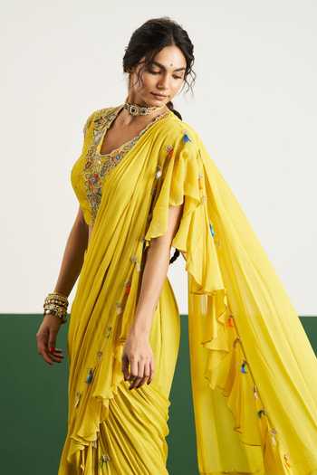 Buy Issa Studio By Chetana & Swathi Yellow Georgette, Net V-neck Ziva Pre-draped Ruffle Saree And Blouse Online at Aza Fashions Buy_Issa Studio By Chetana & Swathi_Yellow Georgette, Net V-neck Ziva Pre-draped Ruffle Saree And Blouse _Online_at_Aza_Fashions
