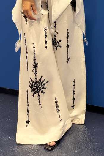 Buy_Dilnaz_Ivory Linen Bead Placement Embroidered Trouser _Online_at_Aza_Fashions