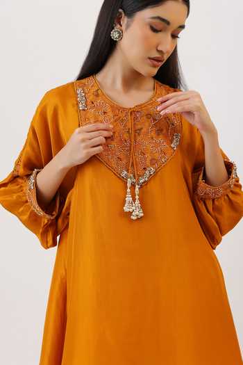 Vidushi Gupta_Mustard Silk, Cotton, Modal Round Neck Floral Thread Work Kurta And Dhoti Pant Set _at_Aza_Fashions