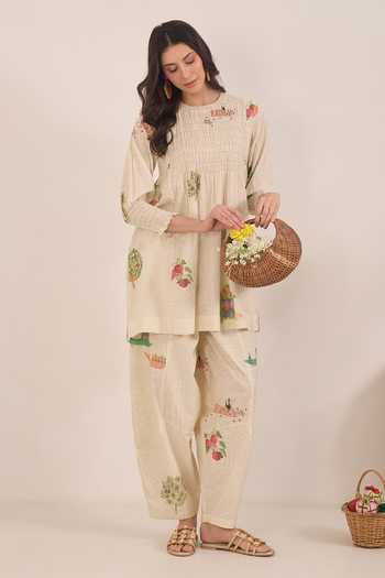 Shop_Shivani Bhargava_Cream Cotton Round Neck, Yes Gulposh Smocking Kurta And Pant Set _Online_at_Aza_Fashions
