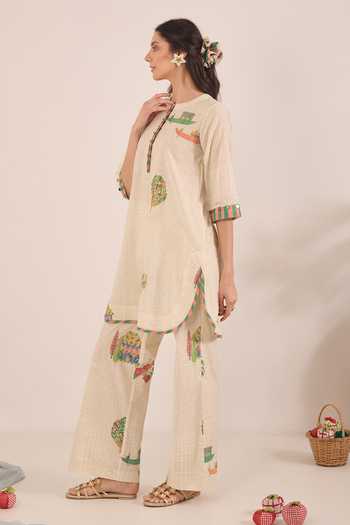 Shivani Bhargava_Cream Cotton Round Neck Gulposh Print Short Tunic _Online_at_Aza_Fashions