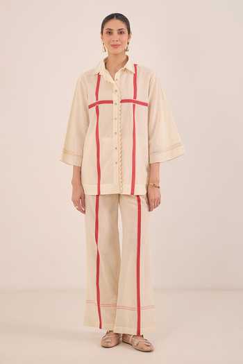 Shivani Bhargava Ivory Cotton Collared Neck Gul Cross Stripe Shirt And Pant Co-ord Set at Aza Fashions Shivani Bhargava_Ivory Cotton Collared Neck Gul Cross Stripe Shirt And Pant Co-ord Set _at_Aza_Fashions