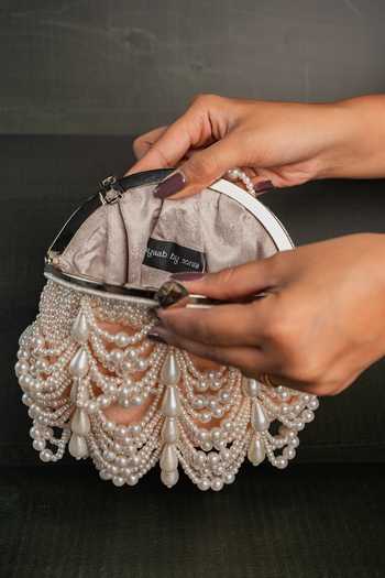 Shop Nayaab By Sonia Pink Oyster Frame Clutch Online at Aza Fashions Shop_Nayaab By Sonia_Pink Oyster Frame Clutch _Online_at_Aza_Fashions