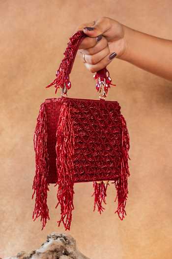 Shop Nayaab By Sonia Maroon Weave Fringe Kasse Bag Online at Aza Fashions Shop_Nayaab By Sonia_Maroon Weave Fringe Kasse Bag _Online_at_Aza_Fashions