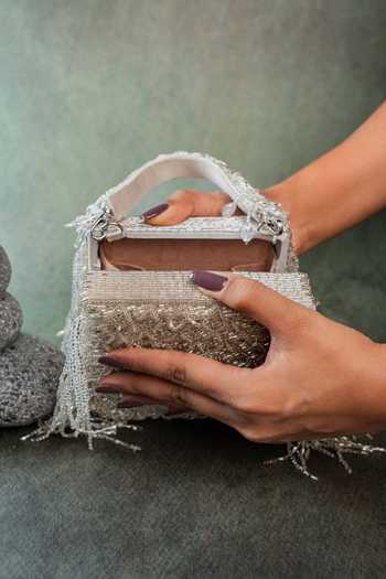 Nayaab By Sonia Silver Weave Fringe Kasse Bag at Aza Fashions Nayaab By Sonia_Silver Weave Fringe Kasse Bag _at_Aza_Fashions
