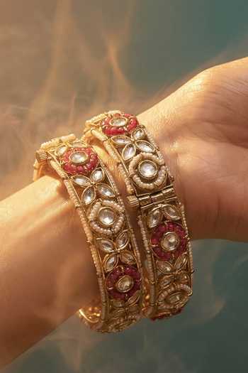 Buy Tussya Gold Plated Kundan Embellished Bangles - Set Of 2 at Aza Fashions Buy_Tussya_Gold Plated Kundan Embellished Bangles - Set Of 2 _at_Aza_Fashions