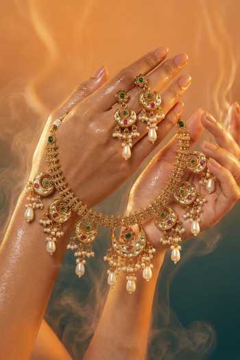 Tussya Gold Plated Crescent Motif Necklace And Earrings Set Online at Aza Fashions Tussya_Gold Plated Crescent Motif Necklace And Earrings Set _Online_at_Aza_Fashions