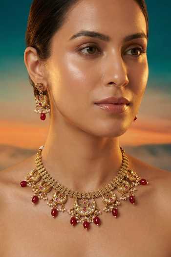 Tussya Gold Plated Carved Motif Necklace And Earrings Set Online at Aza Fashions Tussya_Gold Plated Carved Motif Necklace And Earrings Set _Online_at_Aza_Fashions