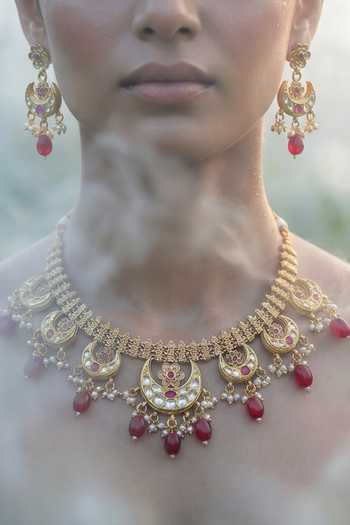 Buy Tussya Gold Plated Carved Motif Necklace And Earrings Set Online at Aza Fashions Buy_Tussya_Gold Plated Carved Motif Necklace And Earrings Set _Online_at_Aza_Fashions