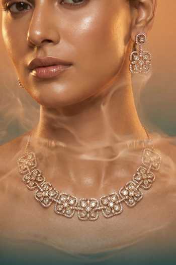 Tussya Gold Plated Floral Carved Necklace And Earrings Set at Aza Fashions Tussya_Gold Plated Floral Carved Necklace And Earrings Set _at_Aza_Fashions