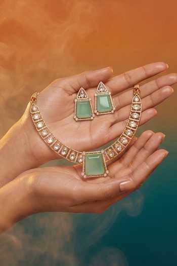 Buy Tussya Gold Plated Stone Accent Necklace And Earrings Set Online at Aza Fashions Buy_Tussya_Gold Plated Stone Accent Necklace And Earrings Set _Online_at_Aza_Fashions