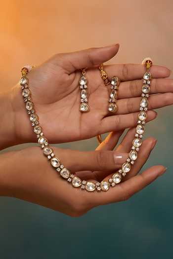 Buy Tussya Gold Plated Stone Embellished Necklace And Earring Set Online at Aza Fashions Buy_Tussya_Gold Plated Stone Embellished Necklace And Earring Set _Online_at_Aza_Fashions