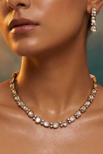 Shop Tussya Gold Plated Stone Embellished Necklace And Earring Set Online at Aza Fashions Shop_Tussya_Gold Plated Stone Embellished Necklace And Earring Set _Online_at_Aza_Fashions