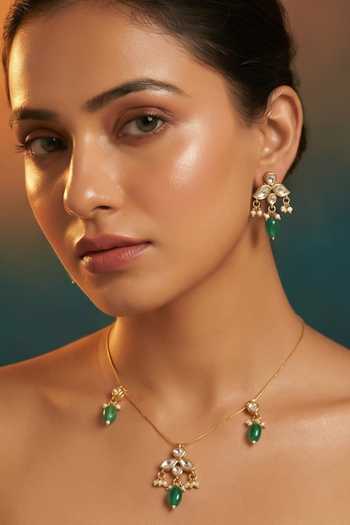 Buy Tussya Gold Plated Floral Carved Necklace And Earrings Set Online at Aza Fashions Buy_Tussya_Gold Plated Floral Carved Necklace And Earrings Set _Online_at_Aza_Fashions