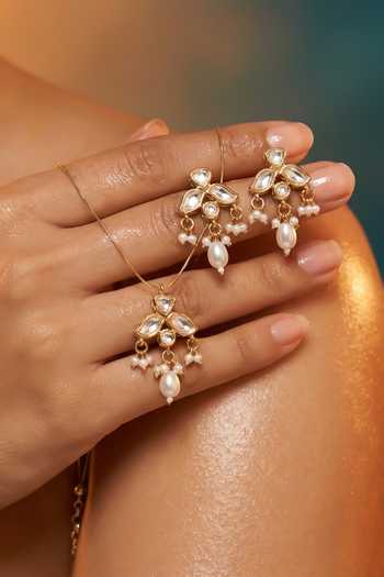 Tussya Gold Plated Kundan Necklace And Earrings Set Online at Aza Fashions Tussya_Gold Plated Kundan Necklace And Earrings Set _Online_at_Aza_Fashions