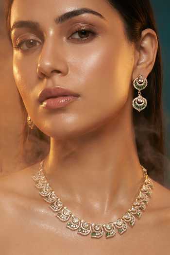 Tussya Gold Plated Kundan Work Necklace And Earrings Set Online at Aza Fashions Tussya_Gold Plated Kundan Work Necklace And Earrings Set _Online_at_Aza_Fashions
