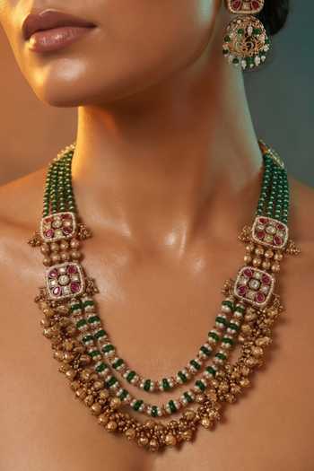 Tussya Gold Plated Multi Strand Beaded Necklace And Earrings Set Online at Aza Fashions Tussya_Gold Plated Multi Strand Beaded Necklace And Earrings Set _Online_at_Aza_Fashions