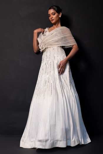 Smriti By Anju Agarwal Ivory Satin, Modal One Shoulder Embroidered Drape Attached Lehenga Set Online at Aza Fashions Smriti By Anju Agarwal_Ivory Satin, Modal One Shoulder Embroidered Drape Attached Lehenga Set _Online_at_Aza_Fashions