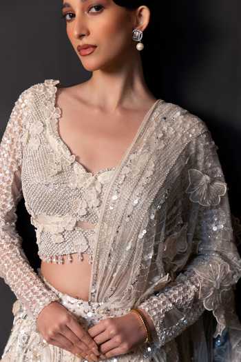 Smriti By Anju Agarwal Ivory Tulle, Net Scoop Neck Noor Eclat Embellished Lehenga And Blouse Set at Aza Fashions Smriti By Anju Agarwal_Ivory Tulle, Net Scoop Neck Noor Eclat Embellished Lehenga And Blouse Set _at_Aza_Fashions