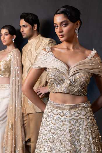 Smriti By Anju Agarwal Gold Organza, Satin Metallic Arc Sequin Embroidered Lehenga With Blouse at Aza Fashions Smriti By Anju Agarwal_Gold Organza, Satin Metallic Arc Sequin Embroidered Lehenga With Blouse _at_Aza_Fashions