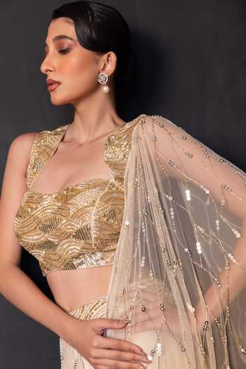 Shop Smriti By Anju Agarwal Gold Organza, Satin, Sheen Empress Layered Lehenga With Drape Attached Blouse Online at Aza Fashions Shop_Smriti By Anju Agarwal_Gold Organza, Satin, Sheen Empress Layered Lehenga With Drape Attached Blouse _Online_at_Aza_Fashions