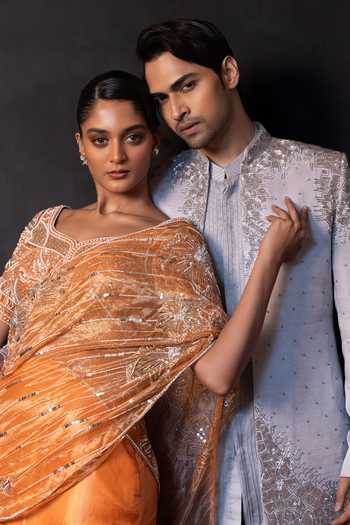 Smriti By Anju Agarwal Orange Organza, Tissue Scoop Glowing Zest Drape Attached Lehenga With Blouse at Aza Fashions Smriti By Anju Agarwal_Orange Organza, Tissue Scoop Glowing Zest Drape Attached Lehenga With Blouse _at_Aza_Fashions