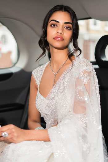 Seema Gujral Ivory Net Sweetheart Neck Sequin Embroidered Saree With Blouse at Aza Fashions Seema Gujral_Ivory Net Sweetheart Neck Sequin Embroidered Saree With Blouse _at_Aza_Fashions