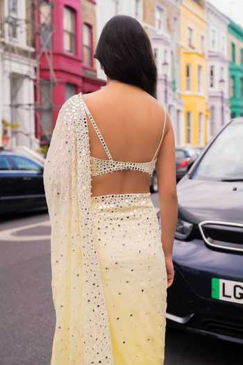 Seema Gujral_Yellow Georgette, Silk Ombre Lemon Mirror Work Saree With Blouse _at_Aza_Fashions
