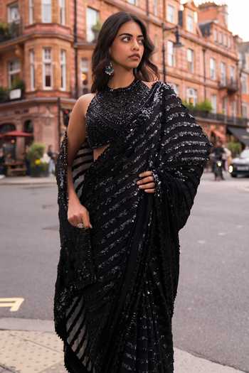 Seema Gujral_Black Georgette, Net Halter Neck Sequin And Crystal Embroidered Saree With Blouse _at_Aza_Fashions