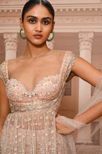 Tarun Tahiliani Pink Tulle Sweetheart Neck Floral Embroidered Peplum Kurta Sharara Set at Aza Fashions Tarun Tahiliani_Pink Tulle Sweetheart Neck Floral Embroidered Peplum Kurta Sharara Set _at_Aza_Fashions