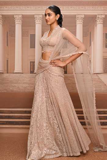 Tarun Tahiliani Rose Gold Net, Tulle V-neck Crystal Lace Concept Pre-draped Saree With Blouse at Aza Fashions Tarun Tahiliani_Rose Gold Net, Tulle V-neck Crystal Lace Concept Pre-draped Saree With Blouse _at_Aza_Fashions