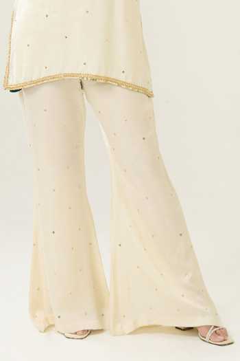 BAHAARA BY DIVYA NARULA Ivory Silk Satin Sequins Halter Neck, Yes Siya Embellished Kurta And Palazzo Set Online at Aza Fashions BAHAARA BY DIVYA NARULA_Ivory Silk Satin Sequins Halter Neck, Yes Siya Embellished Kurta And Palazzo Set _Online_at_Aza_Fashions