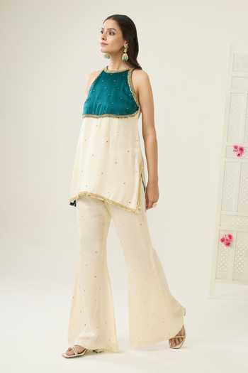 Shop BAHAARA BY DIVYA NARULA Ivory Silk Satin Sequins Halter Neck, Yes Siya Embellished Kurta And Palazzo Set Online at Aza Fashions Shop_BAHAARA BY DIVYA NARULA_Ivory Silk Satin Sequins Halter Neck, Yes Siya Embellished Kurta And Palazzo Set _Online_at_Aza_Fashions