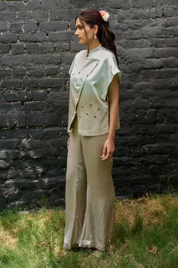 Vedangi Agarwal Blue Satin Mandarin Collar Stone Embellished Top And Pant Set at Aza Fashions Vedangi Agarwal_Blue Satin Mandarin Collar Stone Embellished Top And Pant Set _at_Aza_Fashions